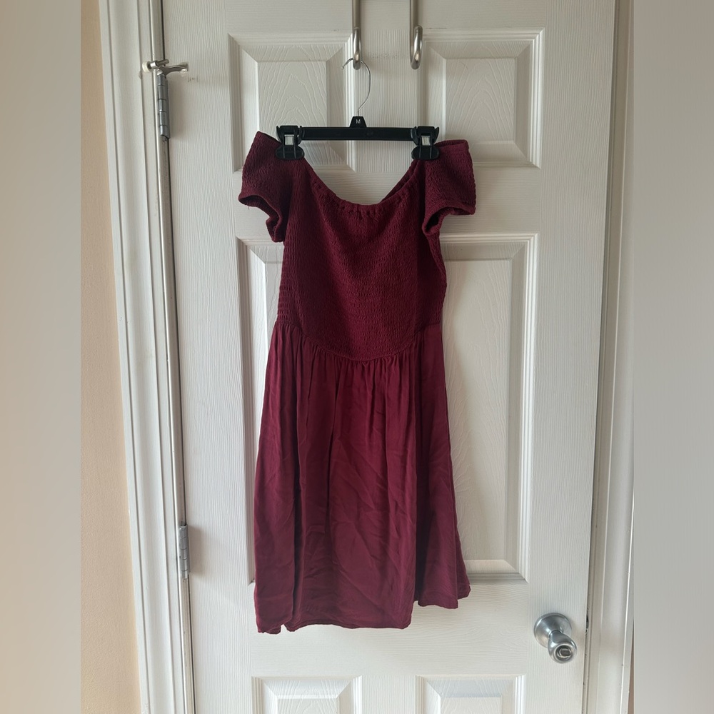 woman’s off the shoulder burgundy dress size: medium